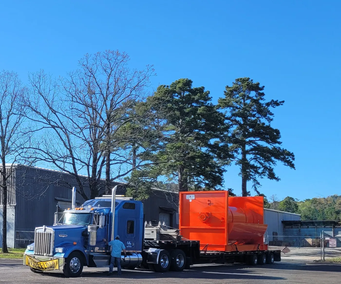 FiberPro equipment leaving the facility on a flatbed truck