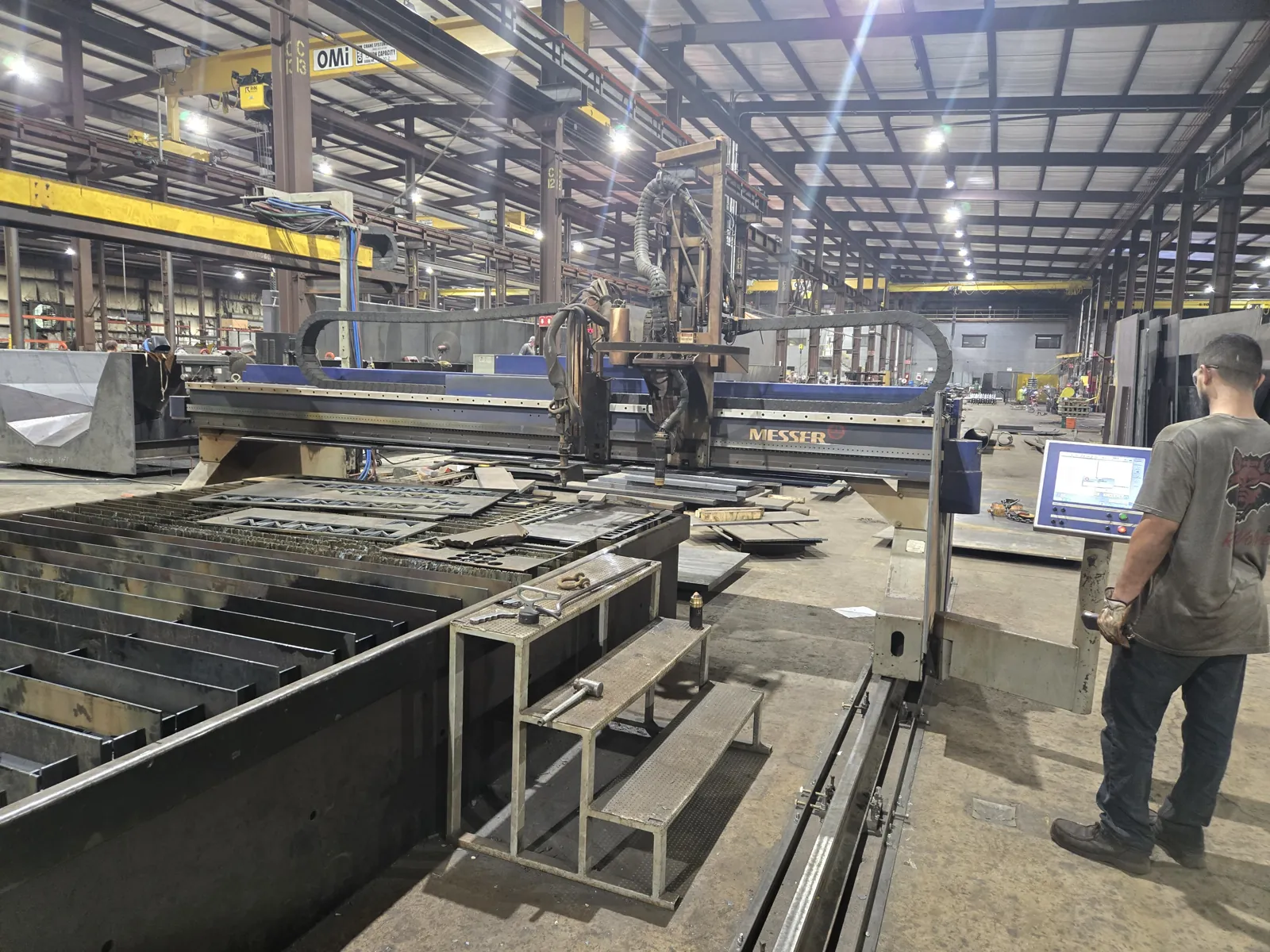 Operator running the CNC plasma burn table