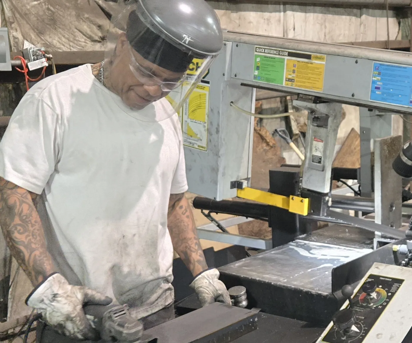 Operator running a computer-controlled saw line