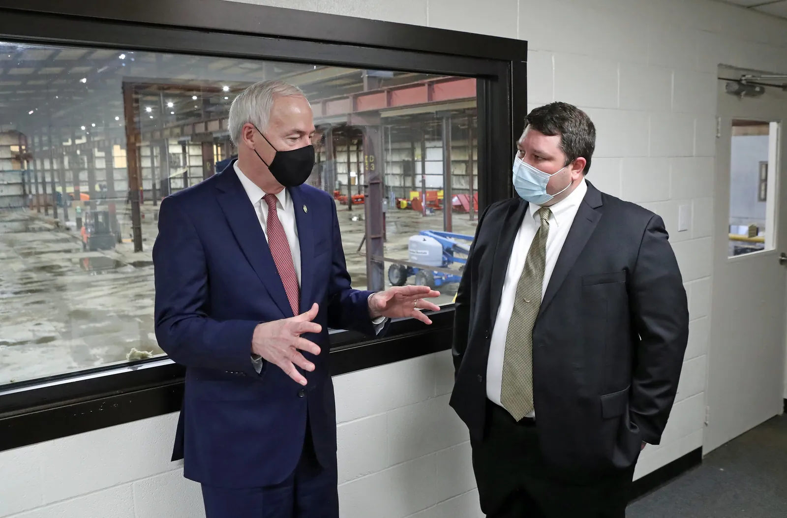 Josh Krauss and Governor Asa Hutchinson at the 2020 building purchase