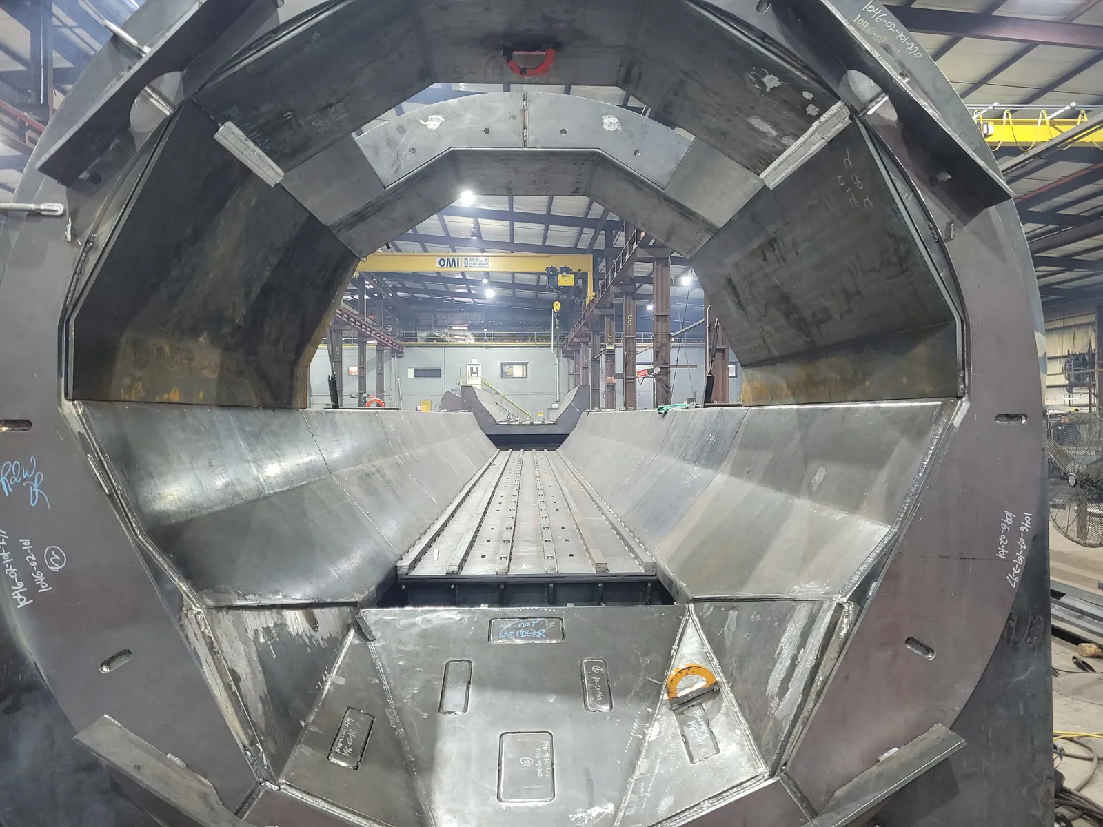 Drum debarker infeed