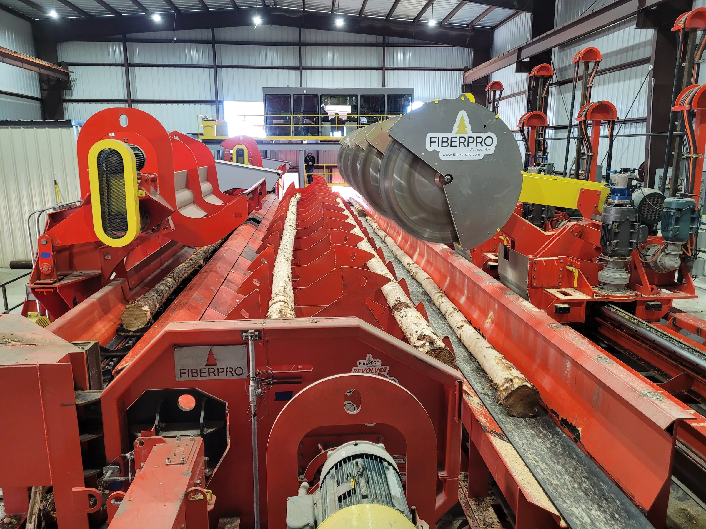 Log merchandising line at Kykenkee Inc.