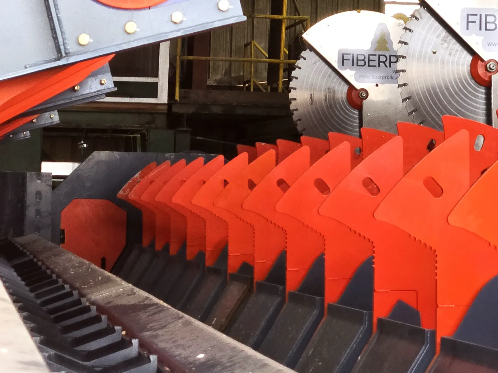 Close view of the FiberPro saw blades above the V-flight scan chain flights